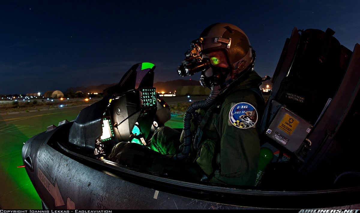 340 SQN pilot prepping for a night sortie