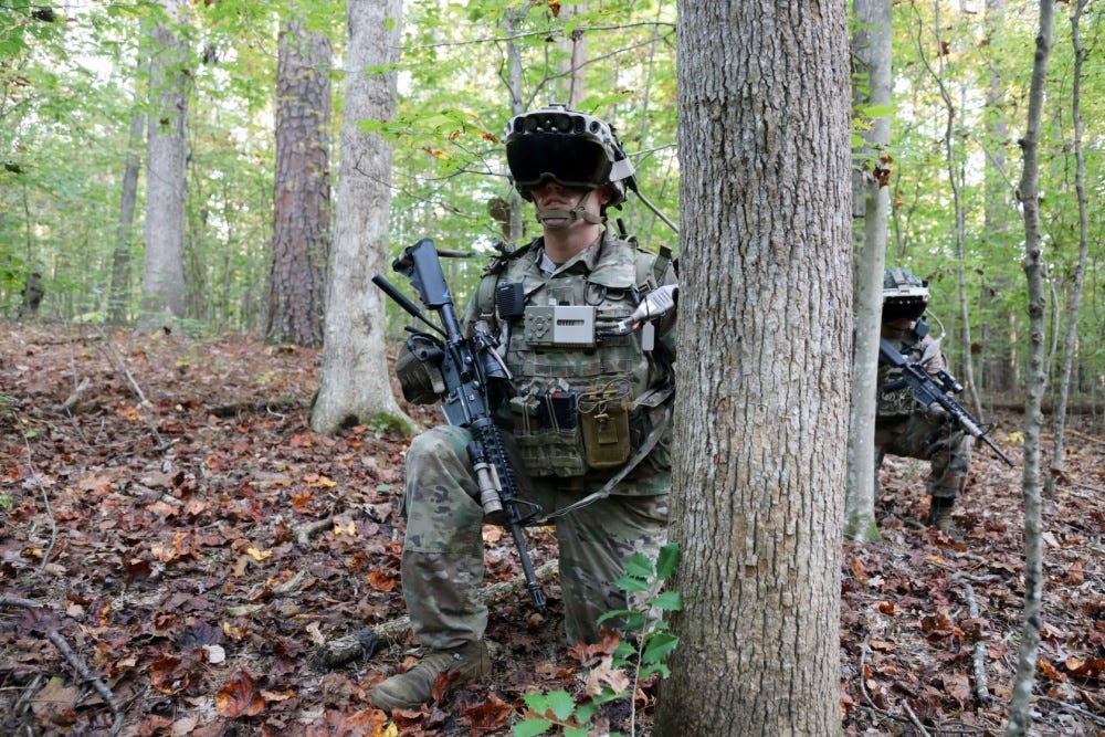 A soldier wearing a prototype IVAS headset.