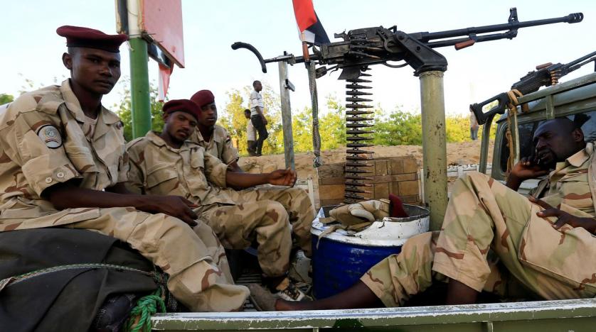 sudanese_military_personnel_are_positioned_near_a_bridge_gate_during_a_sit-in_protest_outside_the_defense_ministry_in_khartoum_sudan_april_15_2019._reuters.jpg