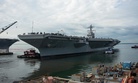 Tugs direct USS Gerald R. Ford (CVN 78) as it gets underway. Ford departed Huntington Ingalls Industries-Newport News Shipbuilding, Va., on Oct. 25, 2019.