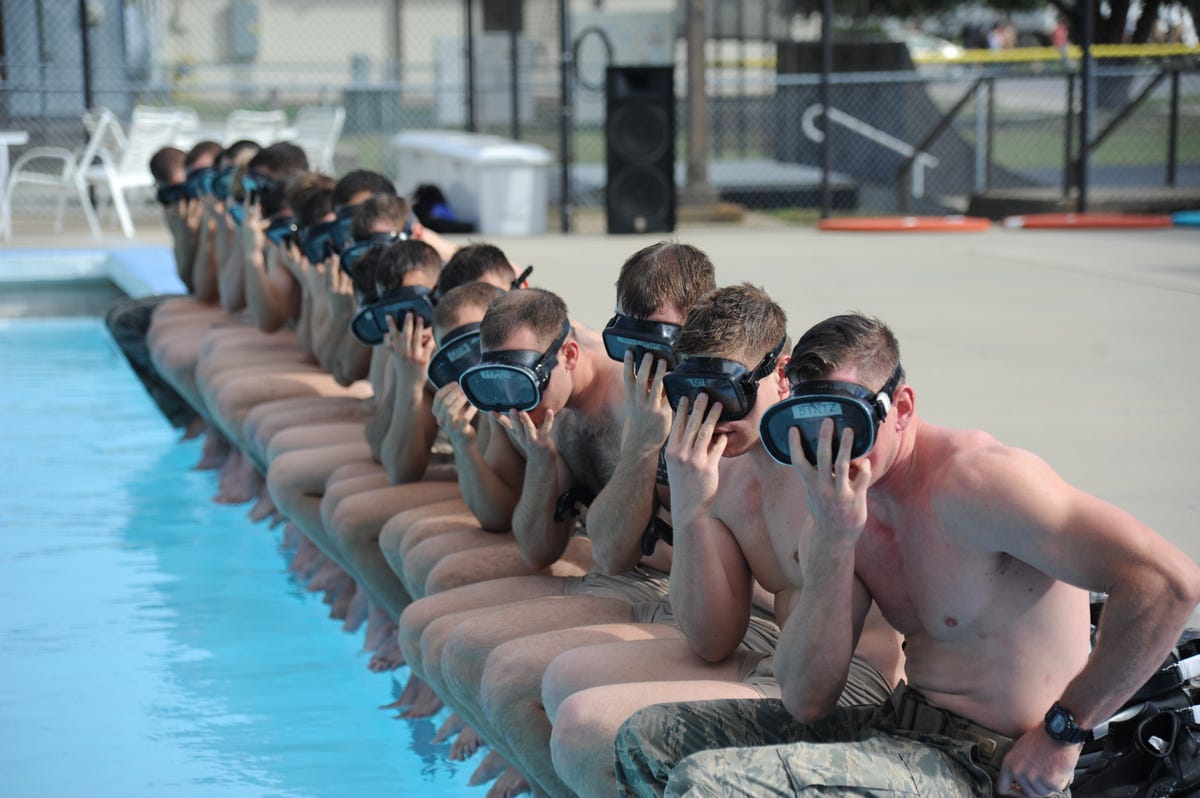 members-of-the-334th-training-squadron-combat-controllers-and-the-335th-training-squadron-special-operations-weather-team-ready-themselves-for-a-physical-training-session.jpg