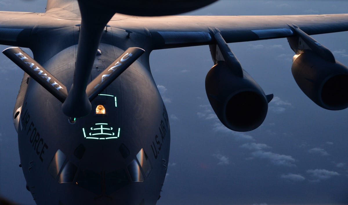 here-a-c-17-is-guided-into-an-aerial-refueling-mission-during-a-training-flight.jpg