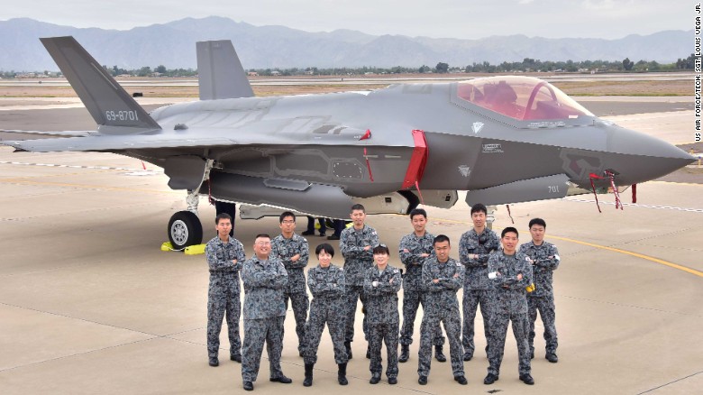 Japanese Air Self-Defense Force personnel pose for a photo during the arrival of the first Japanese F-35A at Luke Air Force Base, Arizona, in 2016.