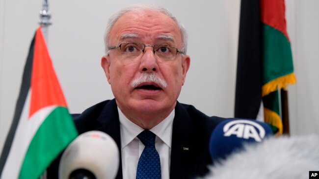 Palestinian Foreign Minister Riad Malki speaks during a press conference at the International Criminal Court, May 22, 2018.