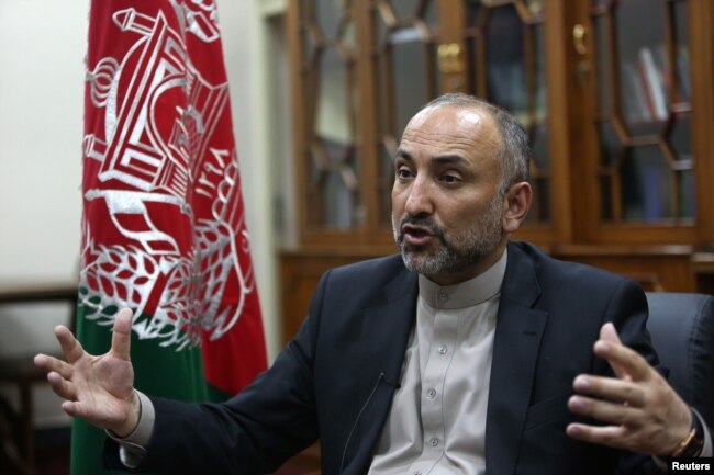 FILE - Then-Afghan National Security Adviser Mohammad Hanif Atmar speaks with The Associated Press, in Kabul, Afghanistan, Oct. 24, 2015.