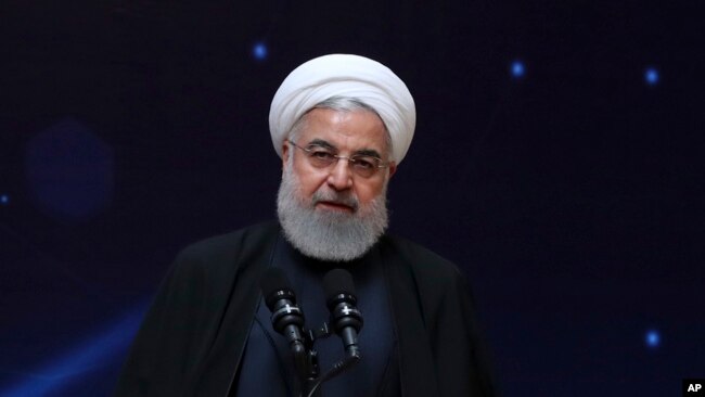 FILE - Iranian President Hassan Rouhani is pictured speaking during a ceremony commemorating National Day of Nuclear Technology, in Tehran, April 9, 2019.