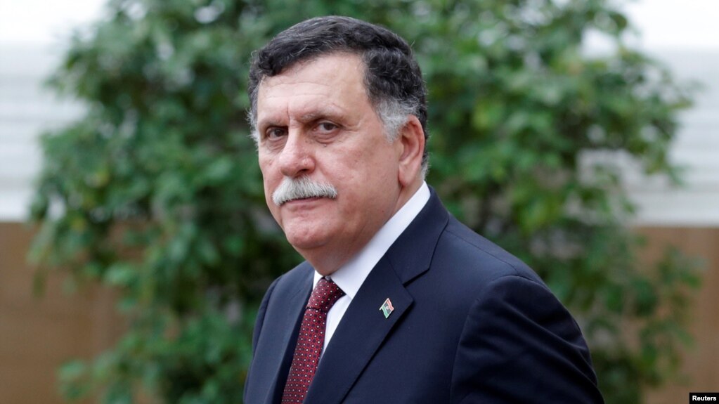 Libyan Prime Minister Fayez al-Sarraj leaves after an international conference on Libya at the Elysee Palace in Paris, May 29, 2018.