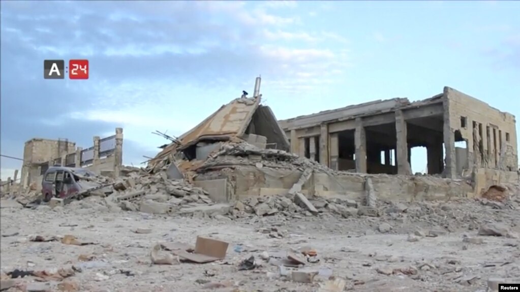 The destroyed remnants of Nabd Al-Hayat hospital that was hit by an airstrike is seen in Hass, Idlib province, Syria, May 6, 2019, in this still image taken from a video on May 9, 2019. 