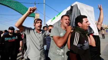 Iraqi men carry the coffin of a demonstrator, who was killed during anti-government protests, at a funeral in Najaf, Iraq October 5, 2019