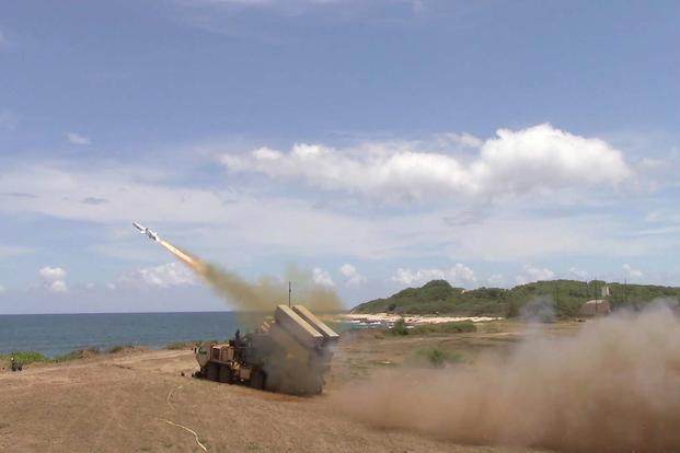 The Army fires a Naval Strike Missile from a Palletized Load System truck, hitting a decommissioned ship at sea, 63 miles north of Kauai, in July 2018 as part of the monthlong Rim of the Pacific Exercise. David Hogan/AMRDEC WDI