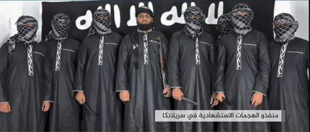 An image grab taken from a press release issued on April 23, 2019 by the Islamic State group’s propaganda agency Amaq, allegedly shows eight men it said carried out a string of deadly suicide bomb blasts on Easter Sunday in Sri Lanka. The man in the centre is believed to be Zahran Hashim, who was identified by the Sri Lankan police as the leader of the Islamist National Thowheeth Jama'ath (NTJ) group, which Colombo has blamed for the attacks.